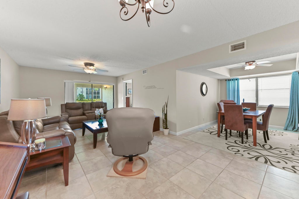 Photo of 7618 Tahiti Lane #106, Lake Worth, FL 33467 (MLS # B26055672)