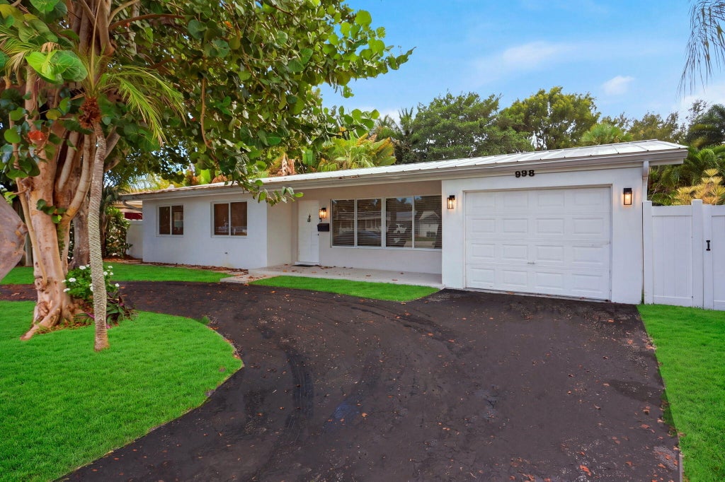 Photo of 998 W CAMINO REAL, Boca Raton, FL 33486 (MLS # B26076409)
