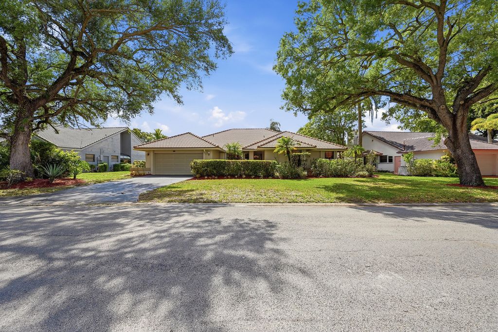 Photo of 5055 NW 89th Way, Coral Springs, FL 33067 (MLS # B26012621)