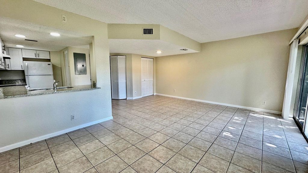 Photo of 1487 NW 94th Way, Coral Springs, FL 33071 (MLS # F10509700)
