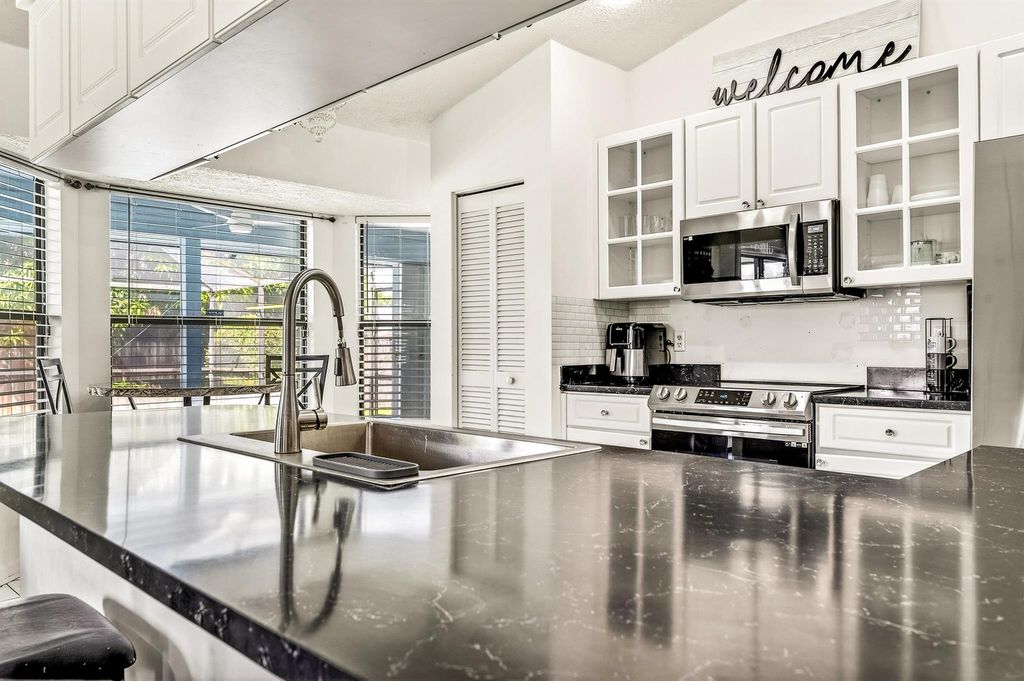 Photo of 1792 SW Cochran Street, Port Saint Lucie, FL 34953 (MLS # R11127049)