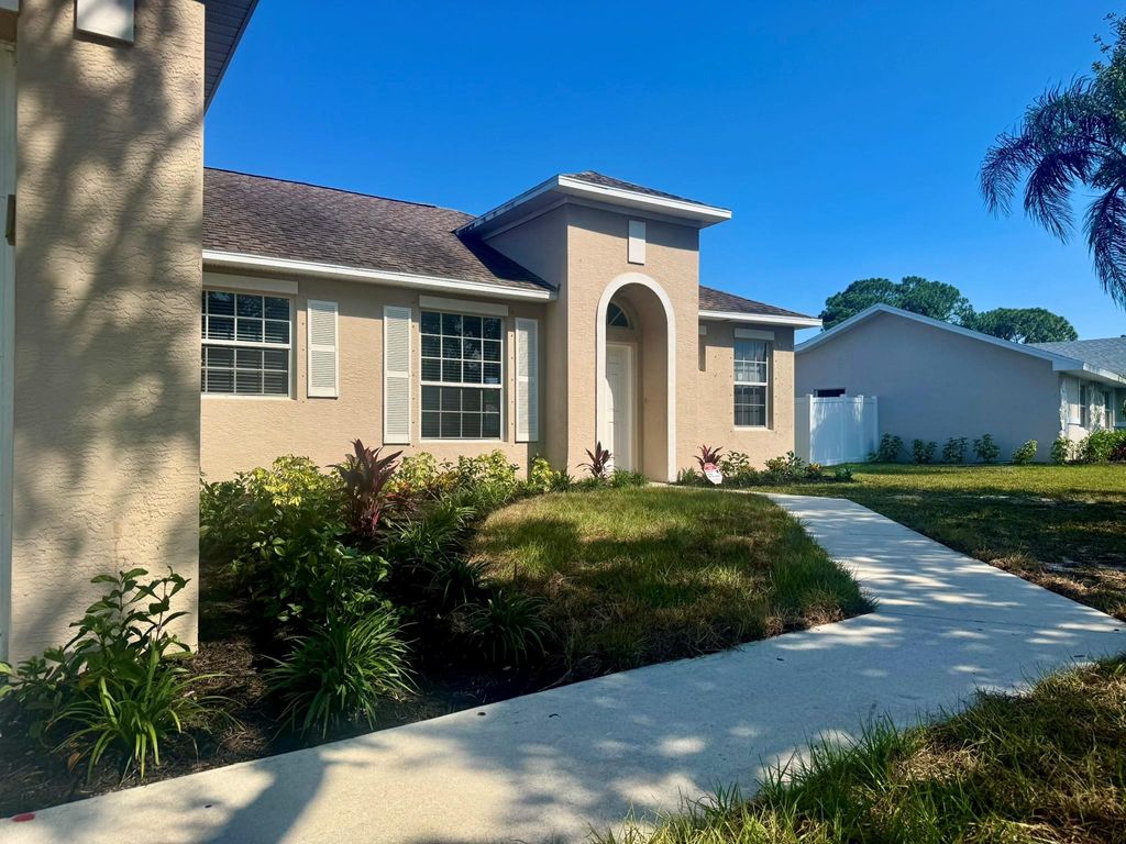 Photo of 2171 SE Holland Street, Port Saint Lucie, FL 34952 (MLS # F10477956)