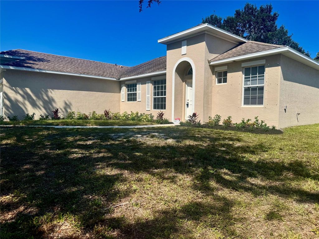 Photo of 2171 SE Holland Street, Port Saint Lucie, FL 34952 (MLS # F10477956)