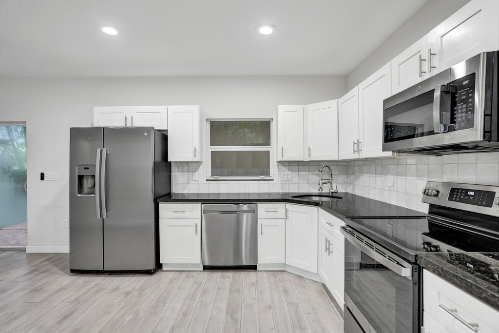 Photo of 1035 NW 2ND Avenue, Fort Lauderdale, FL 33311 (MLS # B26076015)