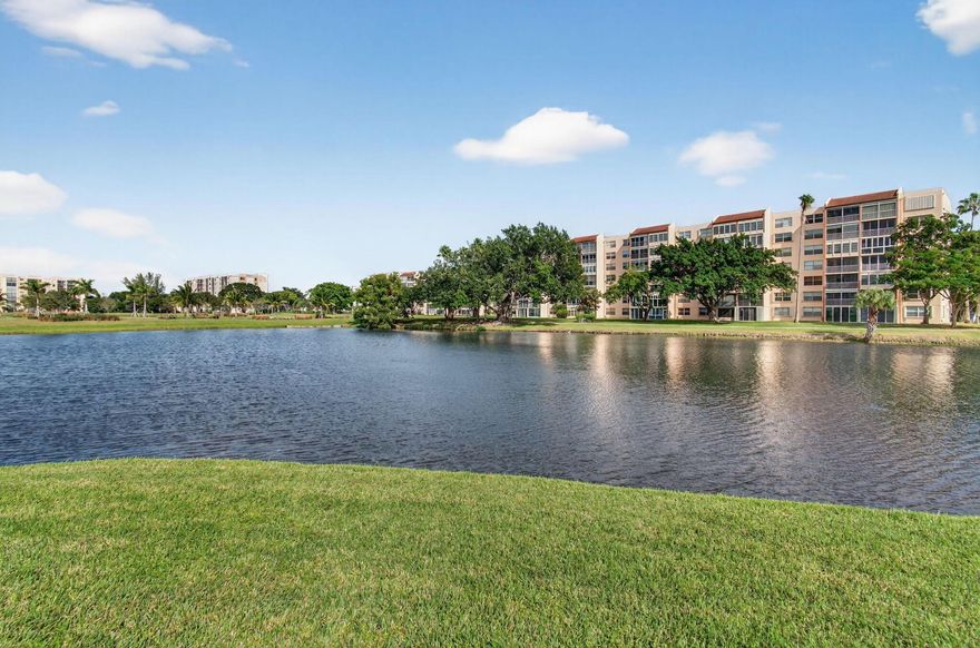 Welcome to Abbey Delray--an inviting 2-bed, 2-bath condo in a desirable 55+ community. This freshly painted first-floor home offers a ton of natural lighting with peaceful lake views from a private patio, making it ideal as a primary residence. Interior features include vinyl and tile flooring, a kitchen with granite counters and white appliances, plus new vanities, mirrors, faucets & light fixtures, four ceiling fans & blinds.  There is crown molding in the living room. The community provides a pool and is conveniently located approximately 8 miles from the beach, close to Delray Medical Center, dining, and shopping. Offered unfurnished. No pets per association. Schedule your showing today!