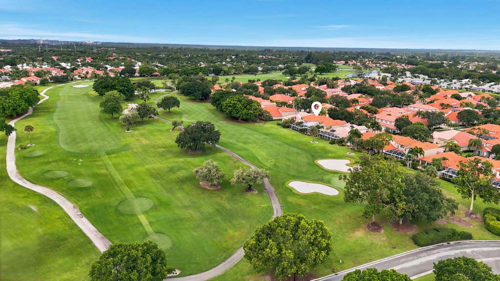 Photo of 2 Monterey Pointe Drive, Palm Beach Gardens, FL 33418 (MLS # B26046506)
