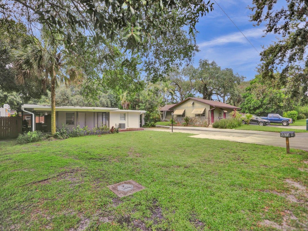 Photo of 5073 SW 28th Avenue, Dania Beach, FL 33312 (MLS # B26077573)