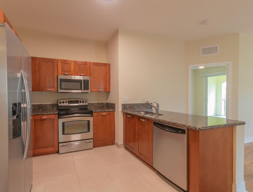 Photo of 51 SE Sedona Circle #203, Stuart, FL 34994 (MLS # R11163411)