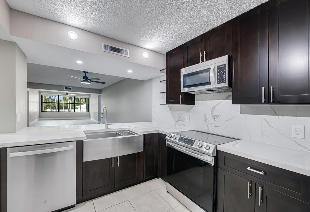 Photo of 3507 Village Boulevard #201, West Palm Beach, FL 33409 (MLS # R11156890)