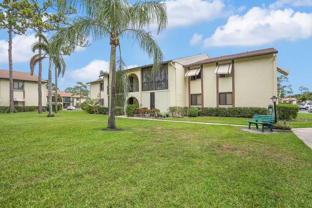 Photo of 331 Knotty Pine Circle #C-1, Greenacres, FL 33463 (MLS # R11094958)