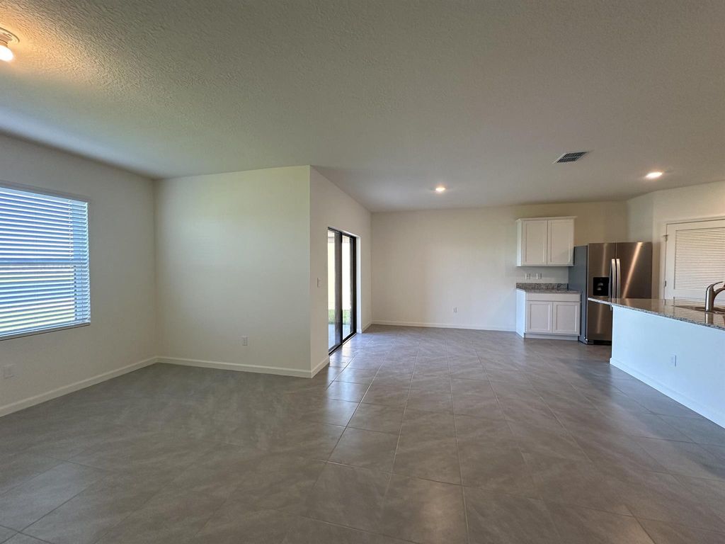 Photo of 9760 SW Triton Way, Port Saint Lucie, FL 34987 (MLS # R10974523)