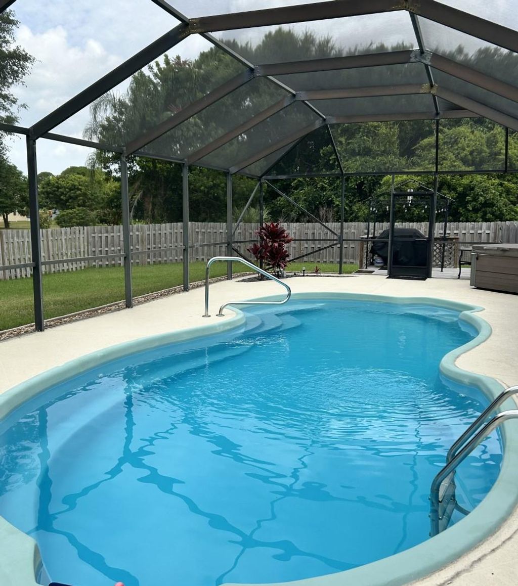 Photo of 2130 SE Elmhurst Road, Port Saint Lucie, FL 34952 (MLS # F10446527)