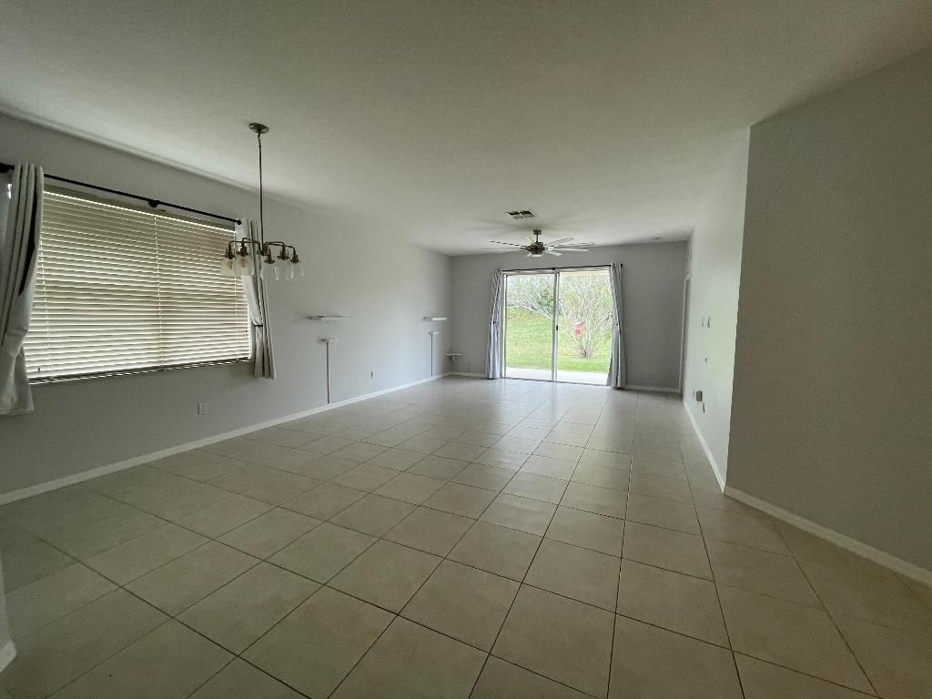 Photo of 9558 SW Flowermound Circle, Port Saint Lucie, FL 34987 (MLS # R10949655)