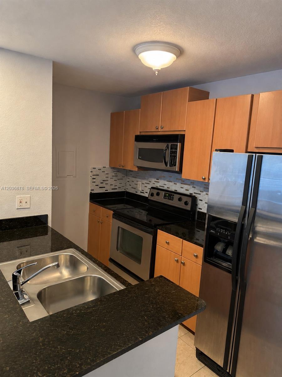 Photo of 1825 Palm Cove Boulevard #7-204, Delray Beach, FL 33445 (MLS # A12036878)