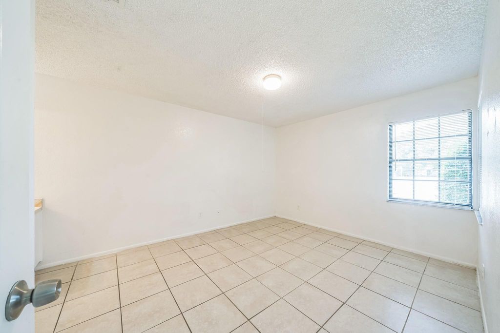 Photo of 390 SW Colesbury Avenue, Port Saint Lucie, FL 34953 (MLS # F10467405)