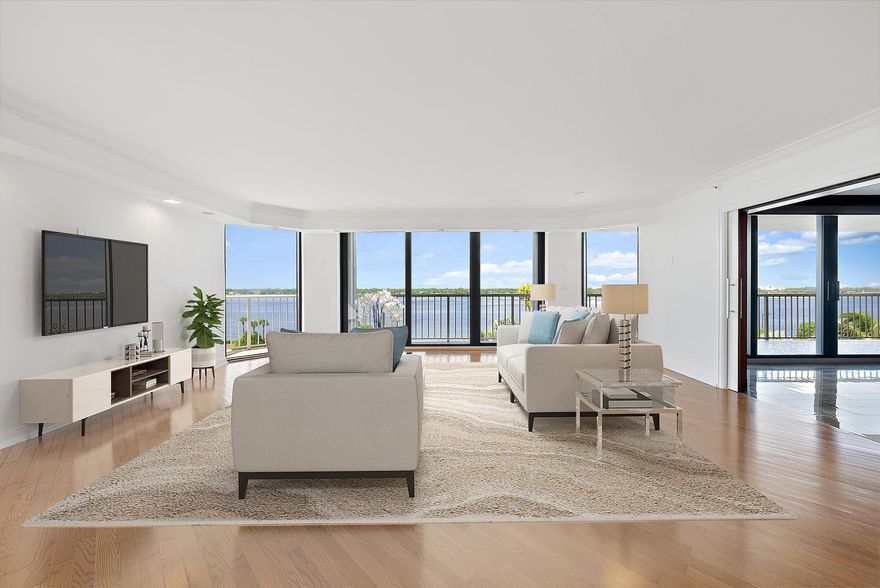 This spacious residence lives like a home and represents one of the best values in Palm Beach.  Spectacular Sunsets & Water Views. Floor-to-ceiling windows in every room, this unit is flooded with light. South West facing for sunlight and sunsets. An incredible opportunity to own a spacious three-bedroom, three-bath residence at The Enclave, a top oceanfront building in Palm Beach. Enter through double doors into a large gracious foyer that opens to an expansive great room and wraparound balcony--perfect for entertaining. The newly renovated primary suite features a luxurious spa-like bath and two walk-in closets. A split floor plan ensures privacy with a generous guest suite and a versatile third bedroom ideal for an office or den. Additional features include a large dining area,