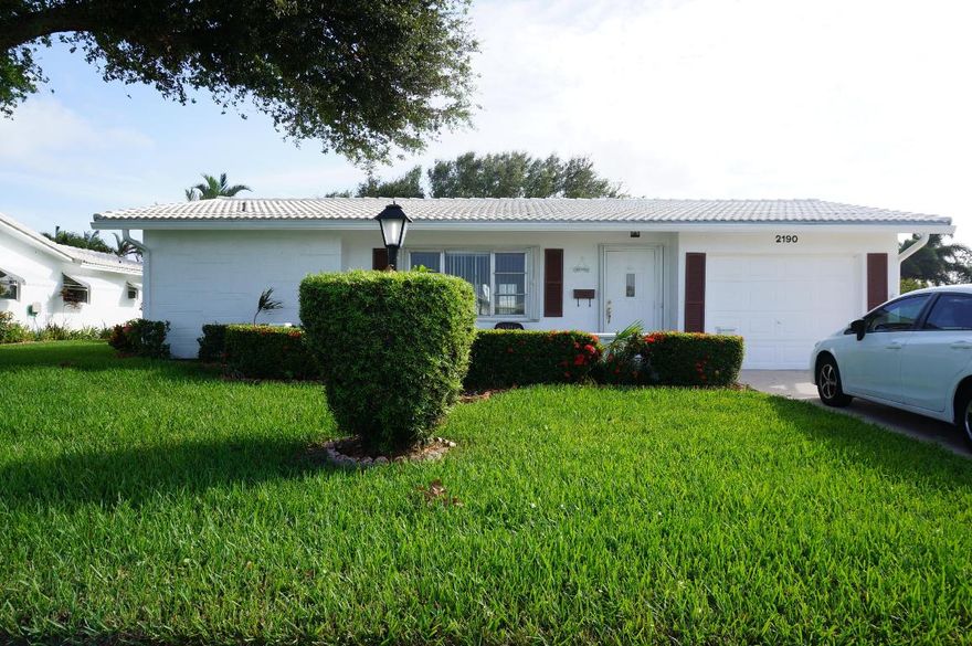 Location location location!!! Pet friendly!! Low hoa!! Challenger on beautiful Lake Roma. Huge lot with beautiful serene setting.  Water views from every room. Split bedroom plan. a/c is brand new, water heater, New neutral carpet (beige) in both bedrooms. Ceramic tile in the rest of the house. This home has a lot to offer, nice big double driveway, front patio, accordion hurricane shutters complete, hurricane garage doors, gutters. Nice size screen enclosure with 5 person jacuzzi looking over the lake and sunsets. Rollups on the back patio. Clubhouse with manager on site. Swimming pool hot tub shuffle board bocce courts billiards tables golf course and many activities. Close to shopping highways night life hospitals restaurants, beaches and much more. Pet friendly