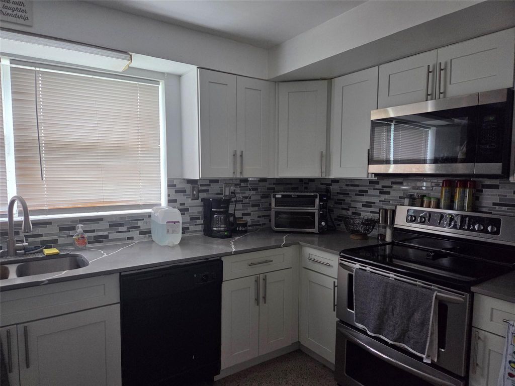 Photo of 2630 SW 49th Ct, Fort Lauderdale, FL 33312 (MLS # F10541412)