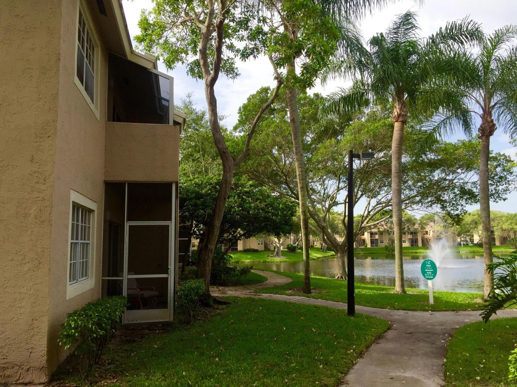 Photo of 660 Cypress Club Way #K11, Deerfield Beach, FL 33064 (MLS # B26018729)