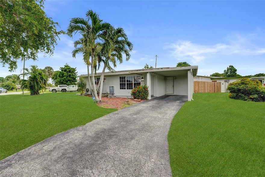Move-in ready 2-bedroom, 1-bath single-family home situated on a corner lot with no HOA. Features include a newer roof, impact windows, and a bright open floor plan. The remodeled kitchen boasts quartz countertops, stainless steel appliances, white shaker cabinets, and pendant lighting. The backyard is fully fenced with plenty of space for a pool, patio, or playset. Additional highlights include a covered carport, outdoor sitting area, and storage shed. Close to schools, parks, and shopping.