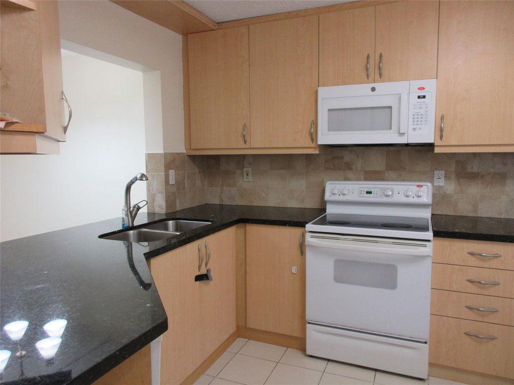 Photo of 9180 NW 40th Street #9180, Coral Springs, FL 33065 (MLS # F10493412)