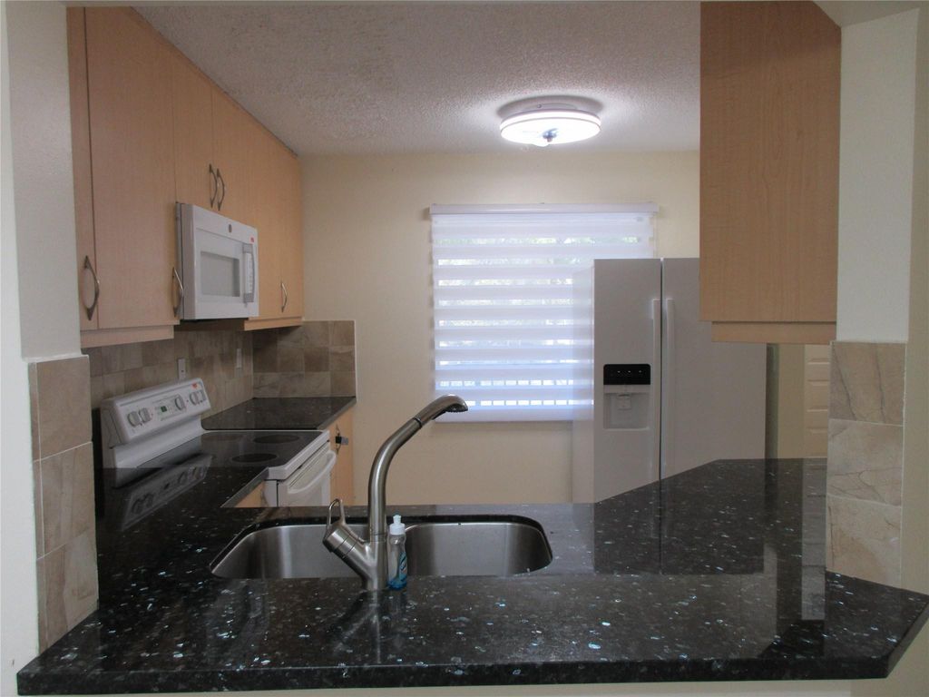 Photo of 9180 NW 40th Street #9180, Coral Springs, FL 33065 (MLS # F10493412)