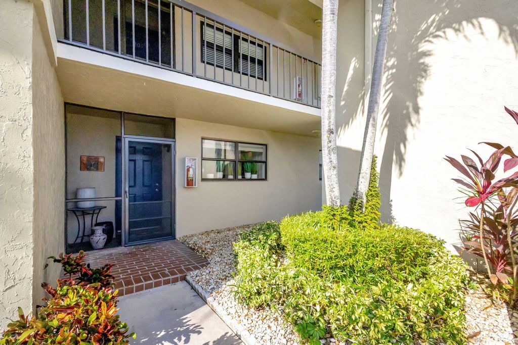 Photo of 13351 Touchstone Place #101, Palm Beach Gardens, FL 33418 (MLS # R11021225)