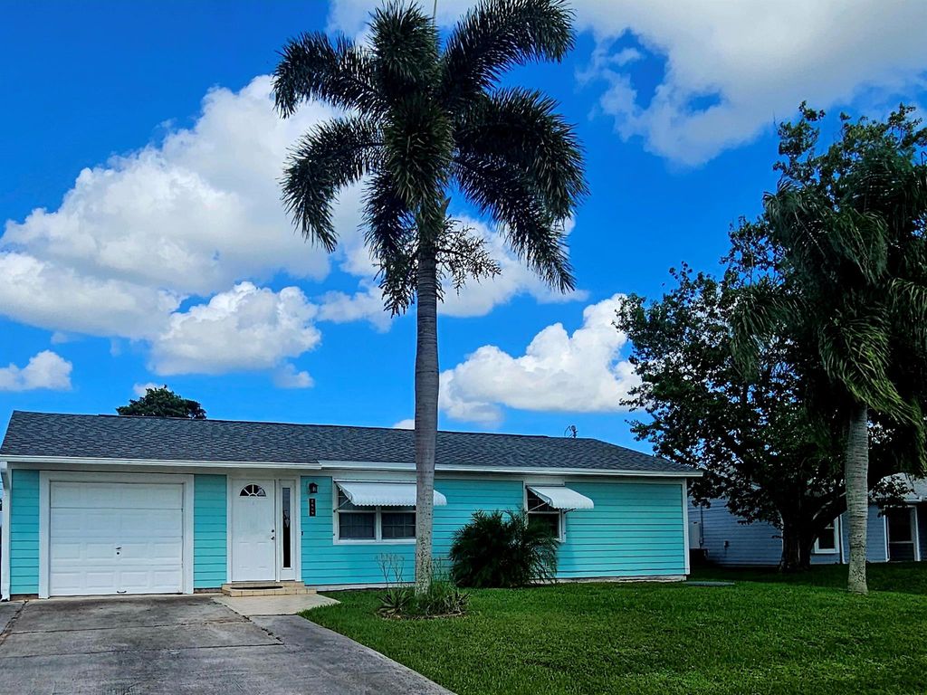 Photo of 1809 SW Idaho Lane, Port Saint Lucie, FL 34953 (MLS # R11013387)