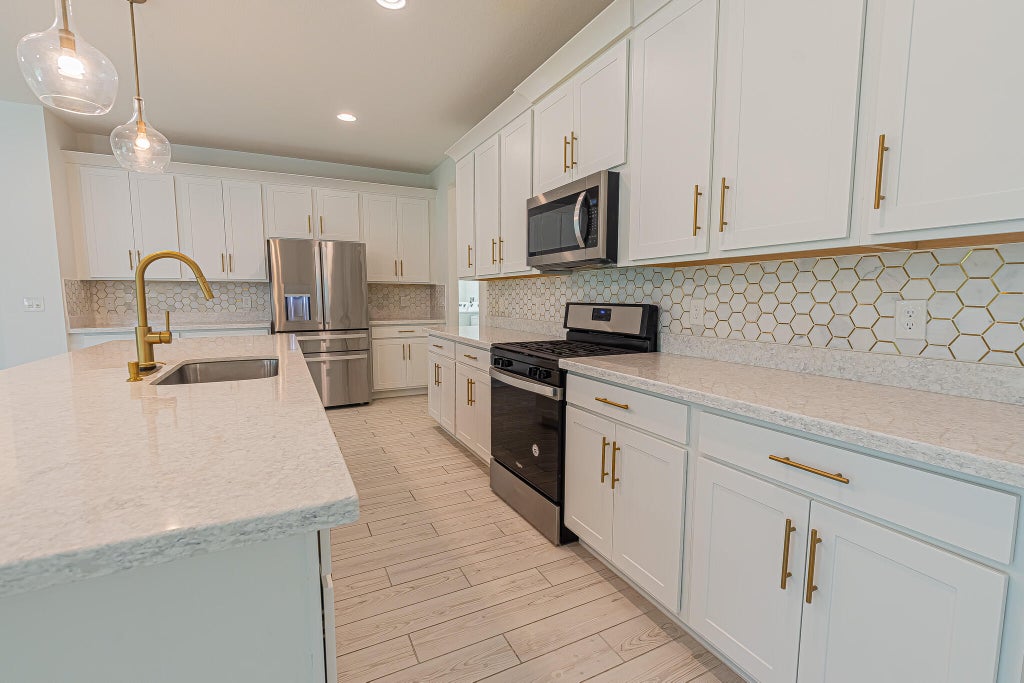 Photo of 11821 SW Lyra Drive, Port Saint Lucie, FL 34987 (MLS # B26072049)