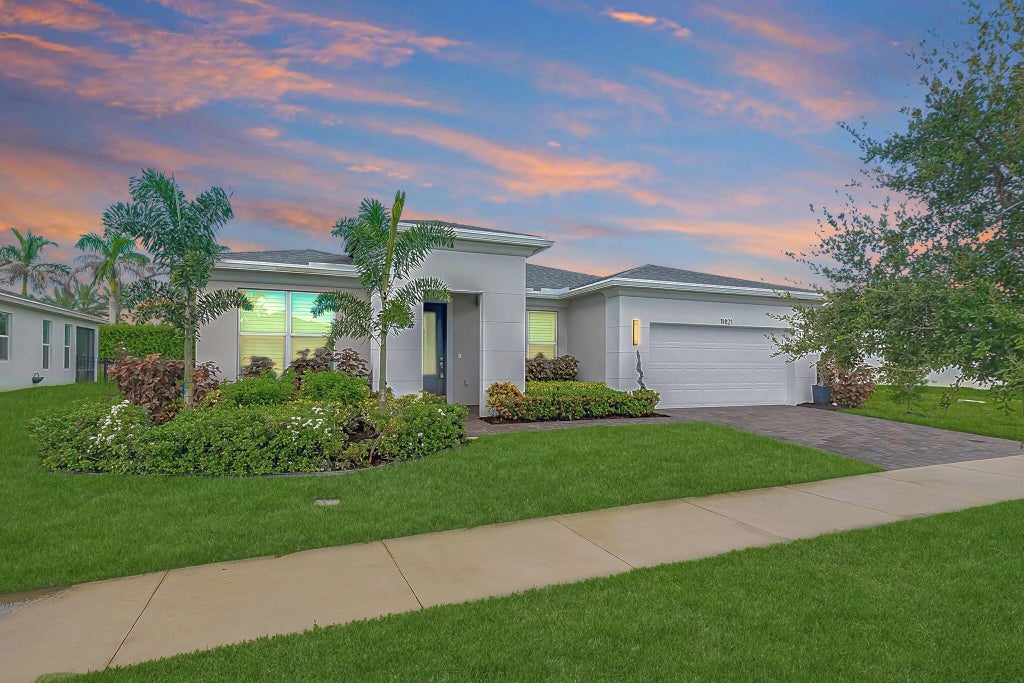 Photo of 11821 SW Lyra Drive, Port Saint Lucie, FL 34987 (MLS # B26072049)