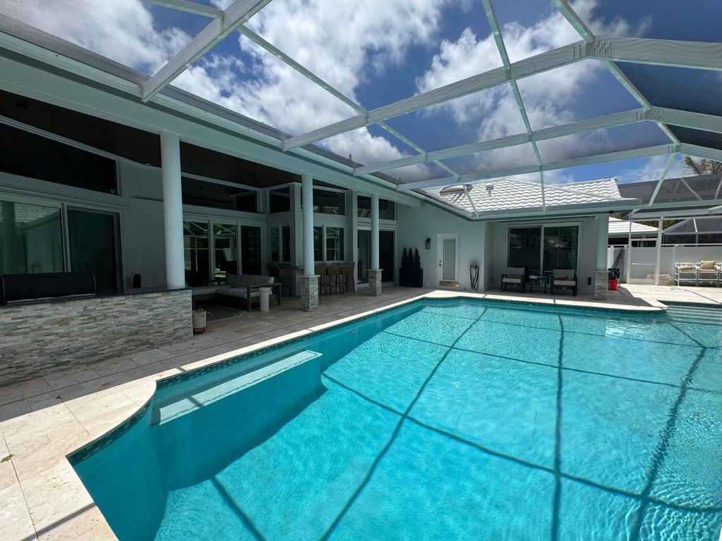 Photo of 6132 Winding Lake Drive, Jupiter, FL 33458 (MLS # B26031520)