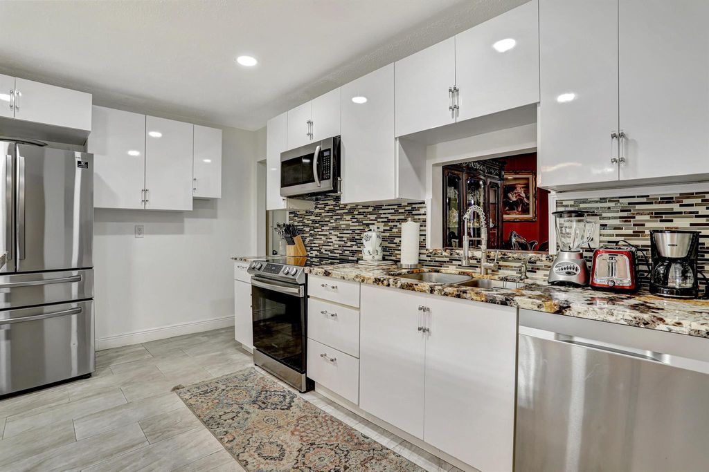 Photo of 4745 Satinwood Trail, Coconut Creek, FL 33063 (MLS # R10923631)