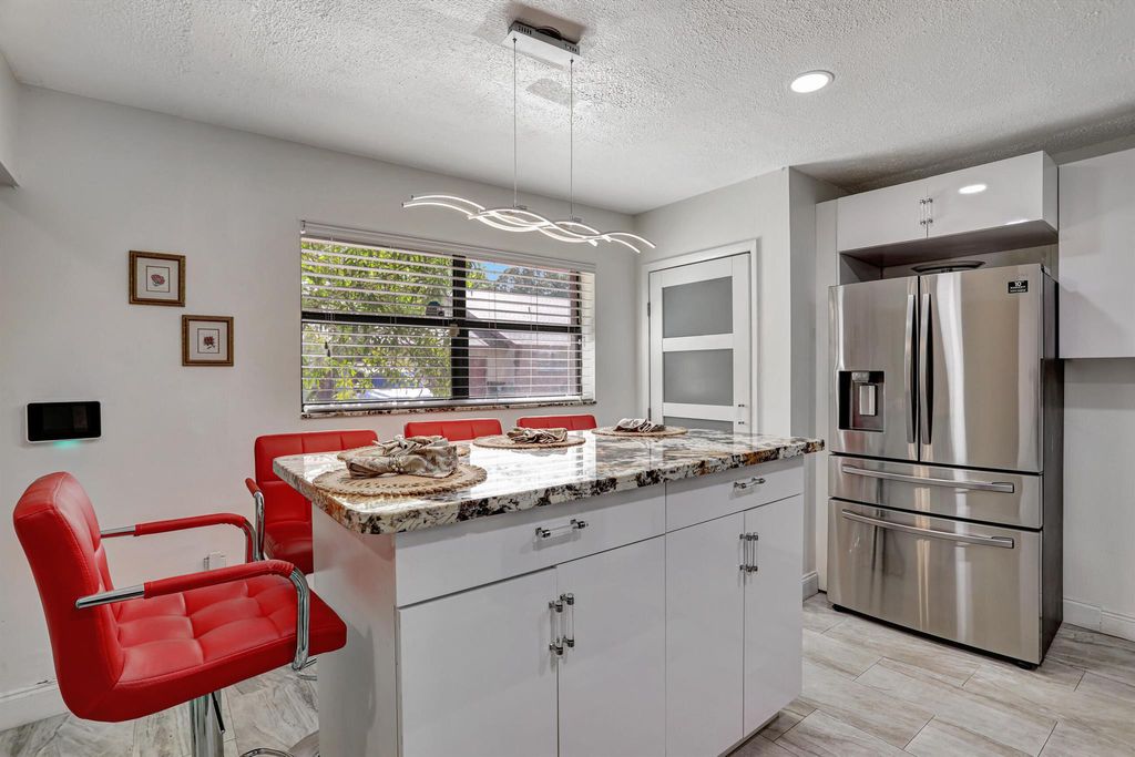 Photo of 4745 Satinwood Trail, Coconut Creek, FL 33063 (MLS # R10923631)