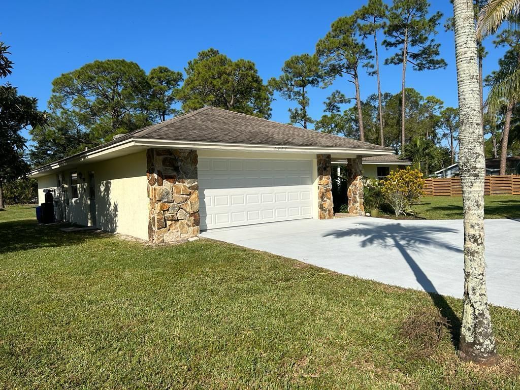Photo of 4871 127th Trail N, Royal Palm Beach, FL 33411 (MLS # R11061382)