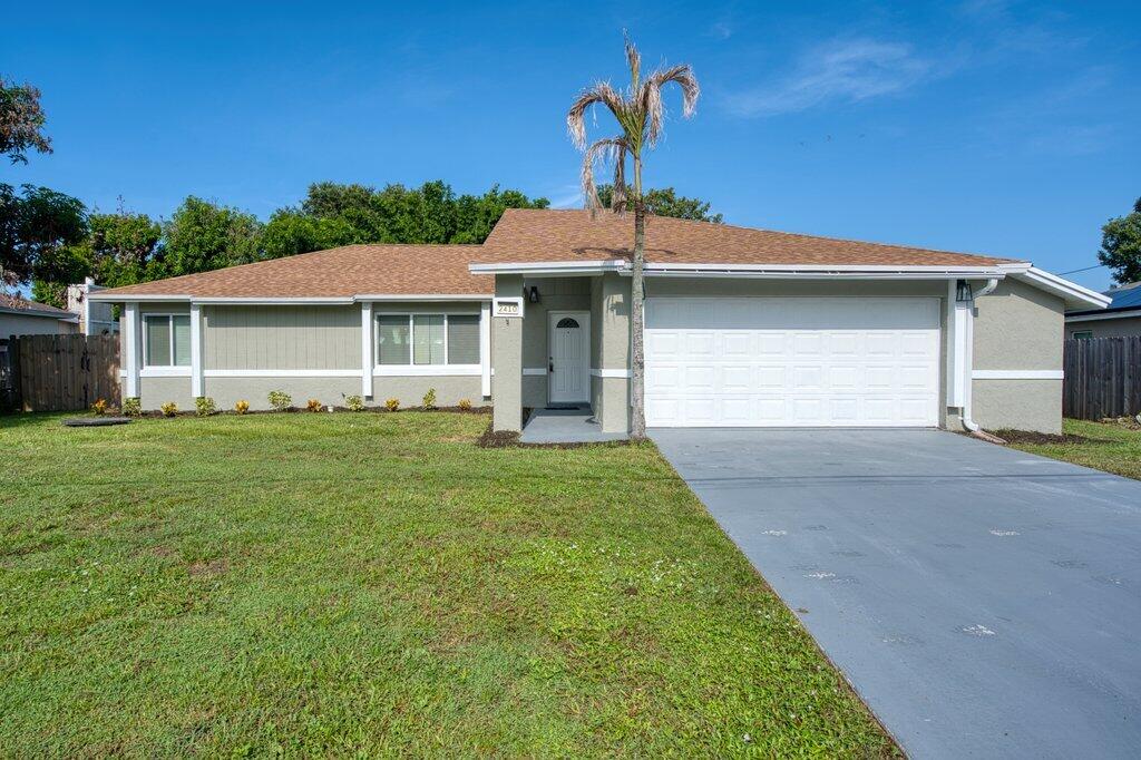 Photo of 2410 SE Warwick Street, Port Saint Lucie, FL 34984 (MLS # B26065464)