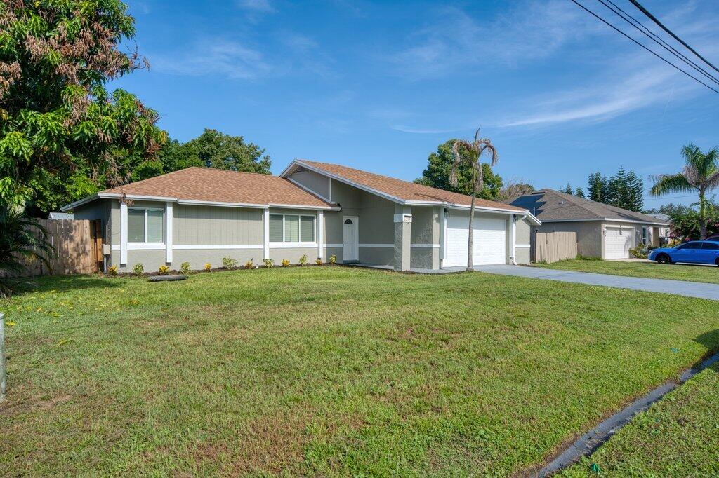 Photo of 2410 SE Warwick Street, Port Saint Lucie, FL 34984 (MLS # B26065464)