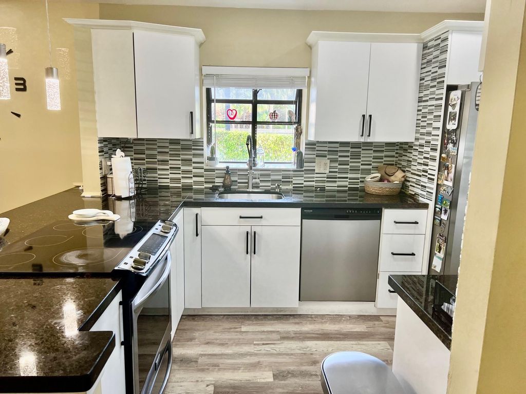 Photo of 8053 Springtree Road #8053, Boca Raton, FL 33496 (MLS # F10555108)