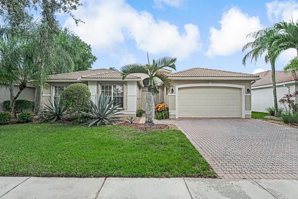 Photo of 7587 Tarpon Cove Circle, Lake Worth, FL 33467 (MLS # R11135348)
