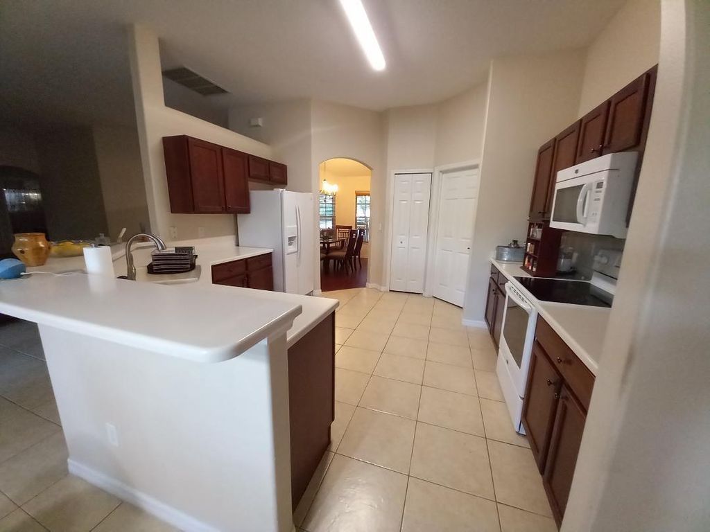 Photo of 1719 SW Leafy Road, Port Saint Lucie, FL 34953 (MLS # R10983796)