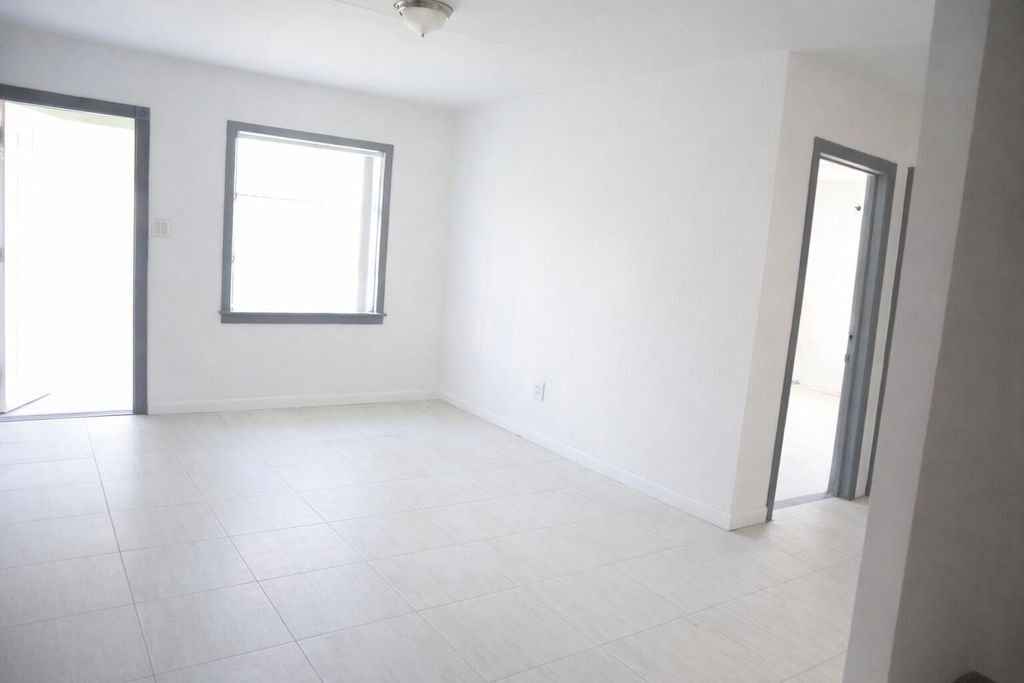 Photo of 1056 NE 34th Court, Oakland Park, FL 33334 (MLS # B26001972)