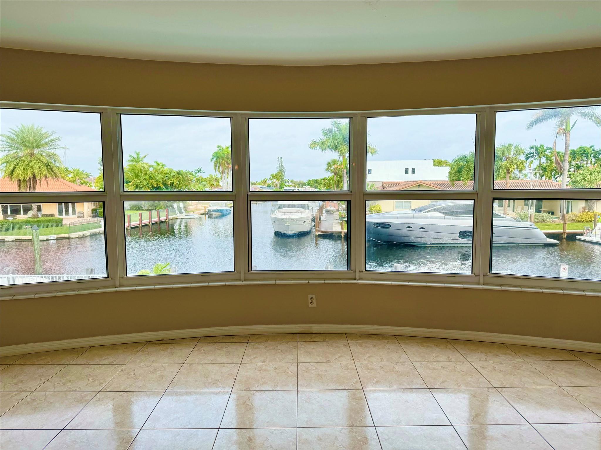 GRAND WATERFRONT VIEWS Of INTERSECTING CANALS AS SOON AS YOU WALK INTO THIS OVERSIZED CORNER UNIT IN THE LANDINGS. Nice & Bright with South/West & North Exposure . NEW IMPACT WINDOWS. REMODELED KITCHEN! TILE FLOORS! MAGNIFICENT LARGE BAY WINDOWS TO ENJOY THE SERENE WATER VIEWS FROM YOUR SUNROOM, LIVING ROOM & MASTER BEDROOM! BOAT LOVERS YOU WILL LOVE THIS!! YACHT VIEWS ALL DAY LONG. DOCKAGE AVAILABLE, for up to 50ft boat. THE SUNROOM GIVES YOU AN ADDITIONAL ROOM THAT CAN BE USED FOR OFFICE OR DEN! PARKING SPOT RIGJT NEXT TO YIUR CONDO! Pets ok! LOCATION in East Fort Lauderdale, just minutes to LAUDERDALE BY THE SEA BEACHES, VILLAGE & RESTAURANTS. As well as shops, freeways and all conveniences. Come see this large condo where you can enjoy the South Florida Lifestyle & million $$$ views.