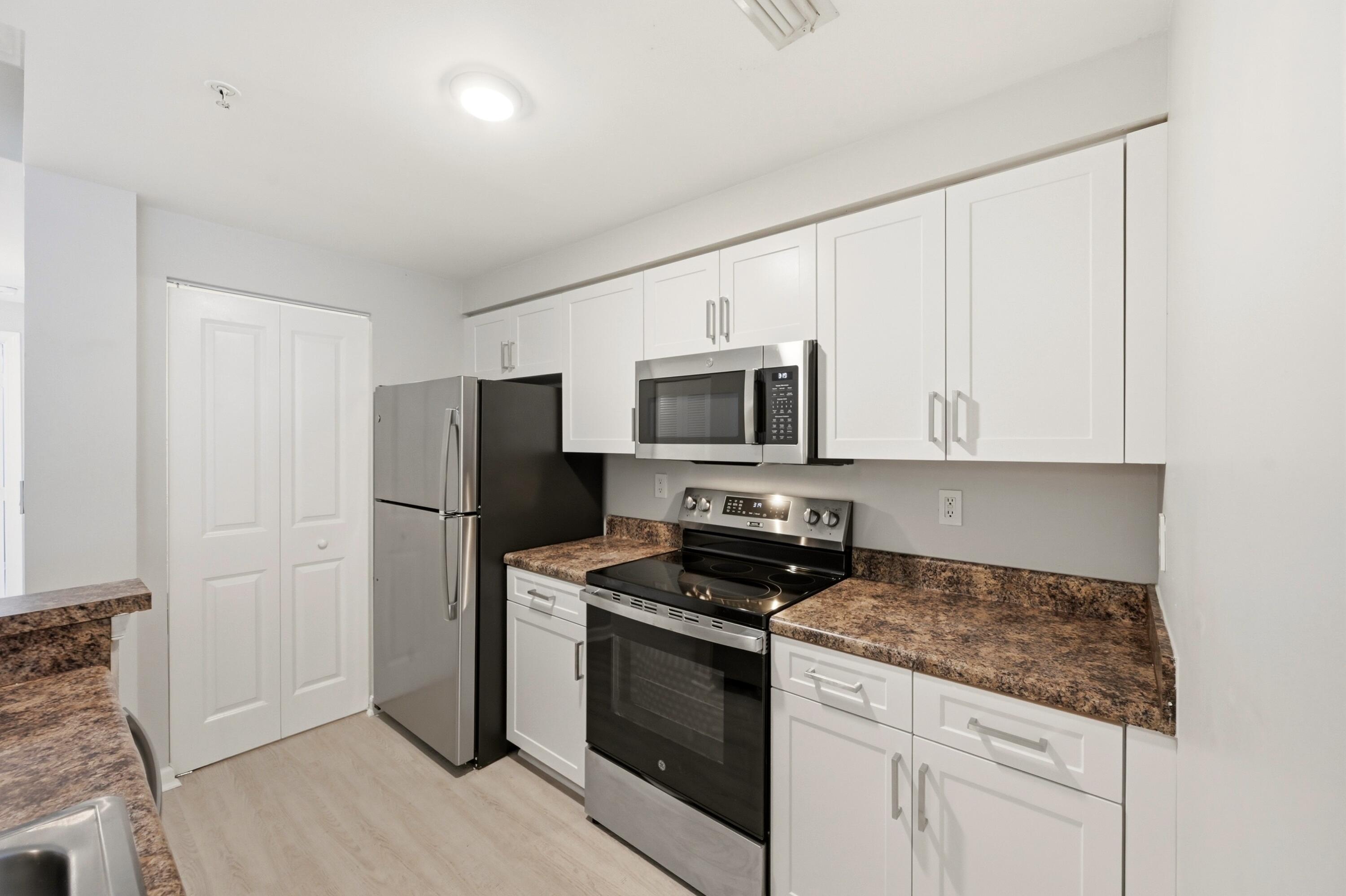 EL-AD POINCIANA CONDO - Residential