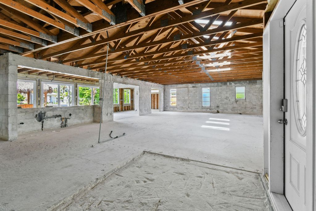 Photo of 15 Tradewinds Circle, Tequesta, FL 33469 (MLS # R10999762)