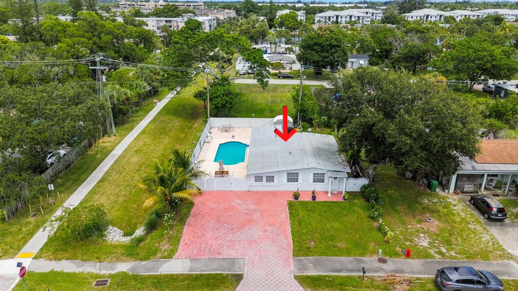 Photo of 3239 DOLAN Road, Palm Springs, FL 33406 (MLS # B26068620)