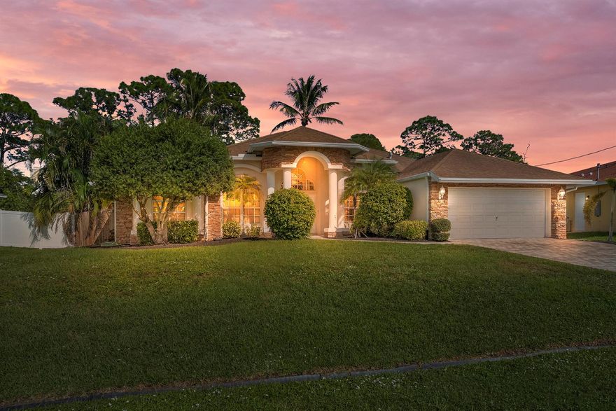 Stunning CBS home features 3 bedrooms plus flex room, 2 baths, and a beautiful private pool all meticulously maintained and move-in ready. Freshly painted interior and professionally pressure-cleaned, including the driveway and exterior, for a move-in-ready feel. The open floor plan boasts soaring vaulted ceilings, 8' doors, and elegant flooring throughout. The spacious kitchen is equipped with new appliances. Enjoy the convenience of dedicated office/flex space, generous walk-in closets, and updated major systems, including a new AC and water softener. Step outside to your private resort-style oasis featuring a heated custom saltwater pool with waterfall, fully screened enclosure, and paver patio.highlights include a paver driveway, generator hookup, fully fenced yard and No HOA