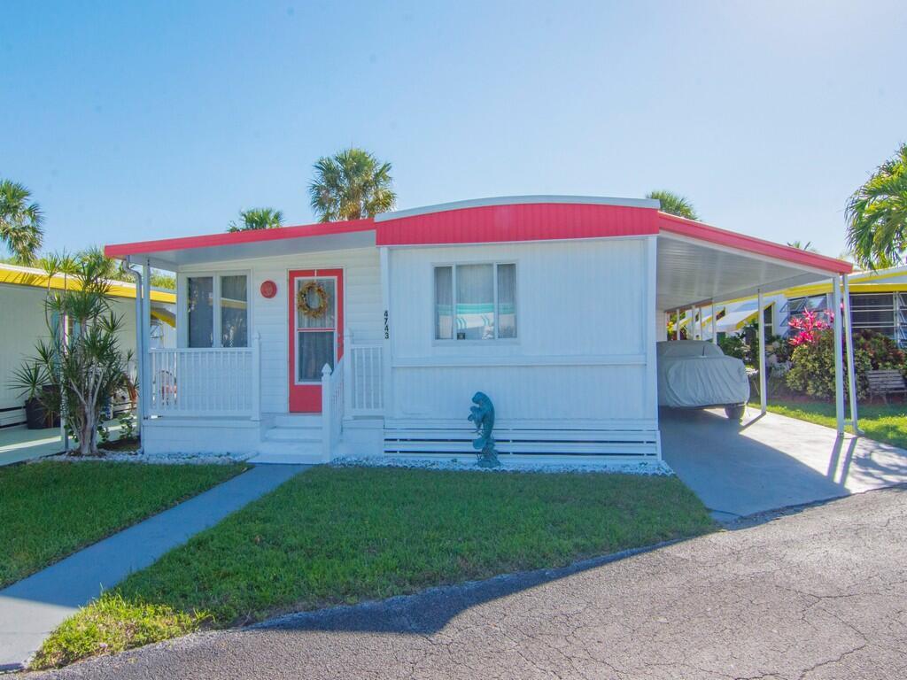 Check out this beauty located just minutes from downtown Jensen Beach. This 2/1.5 mobile home has been completely renovated with new windows, flooring, electrical and the Florida room has been converted to make extra living space. The home comes furnished and is tastefully decorated. This 55+ mobile home park is a hidden gem on the Indian River. HOA is only $305 a month and covers cable, water, lawn maintenance, and all the amenities of the HOA which include heated pool, shuffleboard and a community dock.
