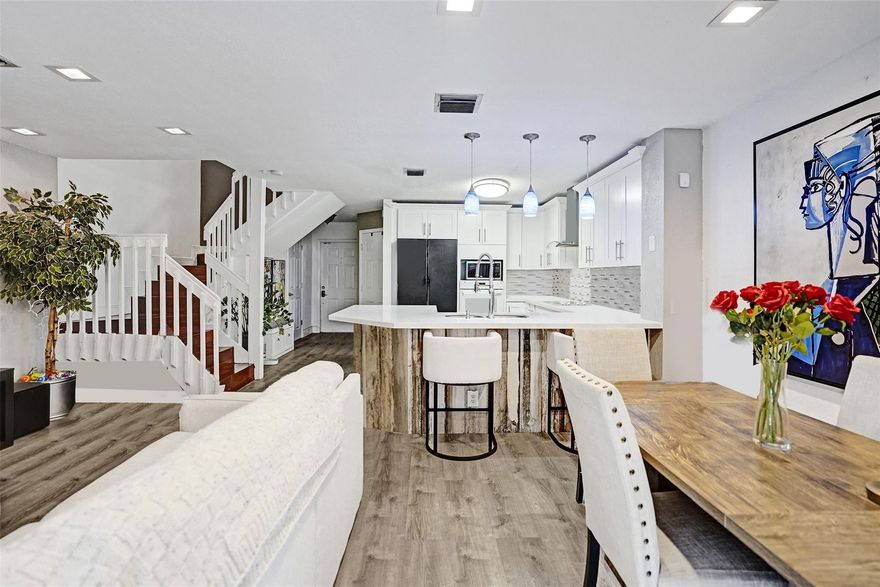 Your DREAM townhome awaits! Ideally located within the peaceful community of Crystal Lake Village, this stunning 2BD|2.5BA + potential 3rd bedroom (den) offers the indoor & outdoor living space that you’ve been searching for. Key features include a NEW A/C, NEW washer & dryer, open chef’s kitchen complemented by quartz countertops & white shaker cabinets, modern recessed lighting, luxury vinyl flooring, 1 car garage, & a spacious master bedroom with vaulted ceilings & walk-in closet. Let’s not forget about the ULTIMATE backyard oasis with artificial turf & outdoor fans, perfect for relaxing & entertaining! You’ll truly take pride in calling this townhome yours. The community aslo has a pool. Schedule a showing today before this gem is gone! 2nd bedroom & den have been virtually staged