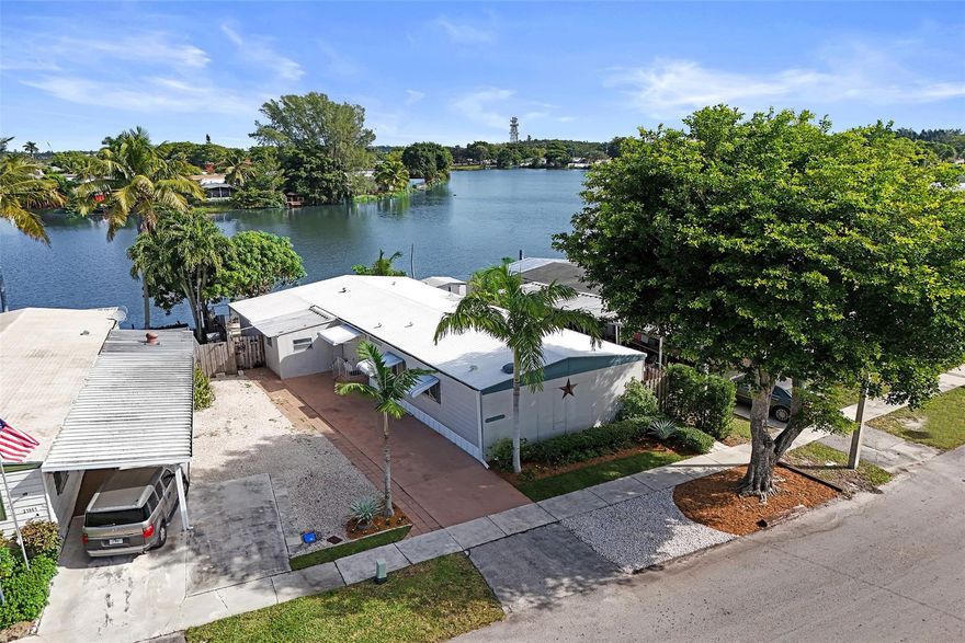 Welcome to this charming 3-bedroom, 2-bath waterfront home Holly lakes. The home features a spacious living area with custom built-ins, a versatile bonus storage room that can easily be enclosed for additional living space or a home office, and a bright Florida room overlooking the water. Enjoy outdoor living with a fenced backyard and patio—perfect for entertaining or relaxing by the peaceful waterfront. Conveniently located in a quiet neighborhood close to parks, shopping, dining, and top-rated schools. Plumbing has been upgraded to PVC, and insurable. Motivated seller.