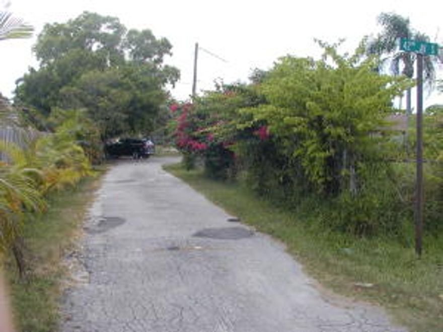 THIS DUPLEX IS AT THE END OF  THE STREET AND NEXT TO A PUBLIX PARK , COMPLETELY FENCE IN, ON A PRIVATE ROAD WITH A 4 CAR PARKING FOR THE TWO UNITS,  THE SHINGLE ROOF IS ONLY LESS THAN 6 YEARS OLD AND CONSTRUCTION IS ALL CBS BLOCK, THE  TWO UNITS ARE IN GREAT SHAPE WITH ALMOST ALL NEW APPLIANCES,BOTH UNIT HAVE SEPARATE ELECTRIC & WATER METER, THEY   ARE  RENTED ON AMONTH TO MONTH  AT $750/$775 CROSSING $18,300 A YEAR & NET $14,000 AFTER ALL EXPENSES OF TAXES & INSURANCE.