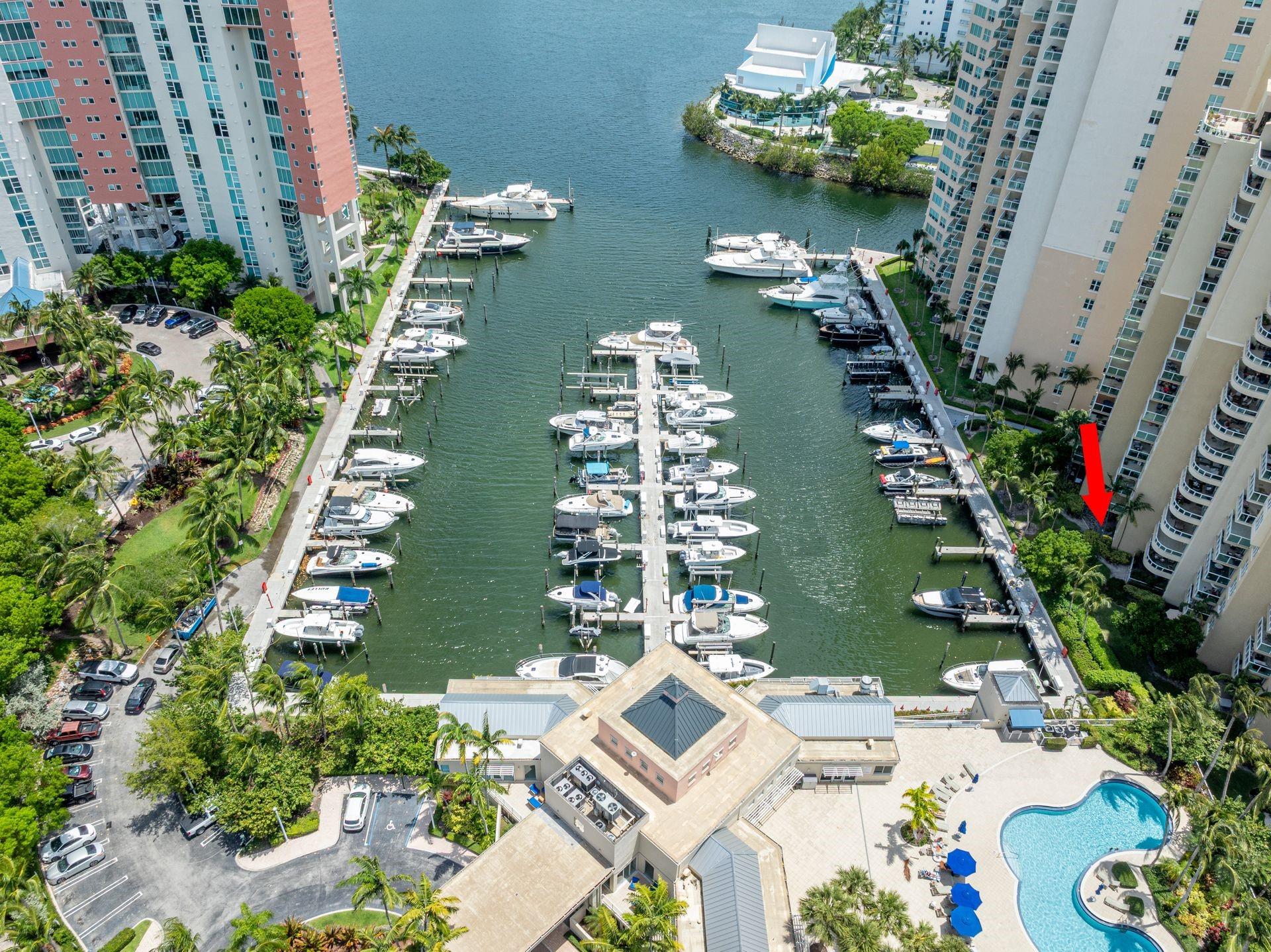 THE FEEL OF A HOUSE, THE CONVENIENCE OF A CONDO, THE BEST VALUE IN AVENTURA!!! UNIQUE GROUND FLOOR CONDO OVERLOOKING THE MARINA AND THE INTRACOASTAL WITH LARGE PAVED COVERED PATIO. SPLIT FLOOR PLAN WITH TWO MASTER SUITES. PORCELAIN FLOORS IN LIVING AREA, KITCHEN AND BATHS, NICE VYNIL FLOORING IN BEDROOMS. SPACIOUS MAIN BEDROOM WITH WALK-IN CLOSET, MASTER BATH HAS DUAL SINKS, ROMAN TUB AND SHOWER. EAT IN KITCHEN WITH SS APPLIANCES AND GRANITE COUNTERTOPS. PLENTY OF AMENITIES... 2 POOLS, JACUZZI, GYM, SPA IN SITE, SAUNA, STEAM ROOM, CARDS ROOM, BILLIARDS, PARTY ROOM. 2 COVERED PARKING SPACES. VERY CLOSE TO AVENTURA MALL AND SHOPPING, NEXT TO FOUNDERS PARK AND MINUTES AWAY FROM THE BEACH.